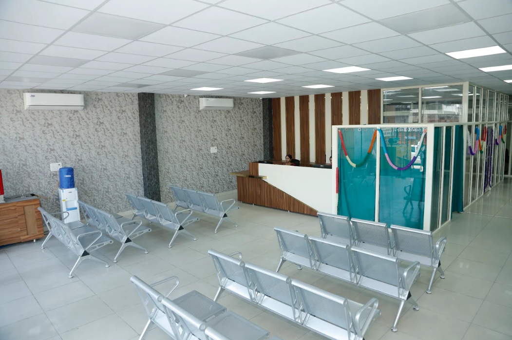 Patient waiting area and reception desk near Ramgharia Chowk, Hoshiarpur